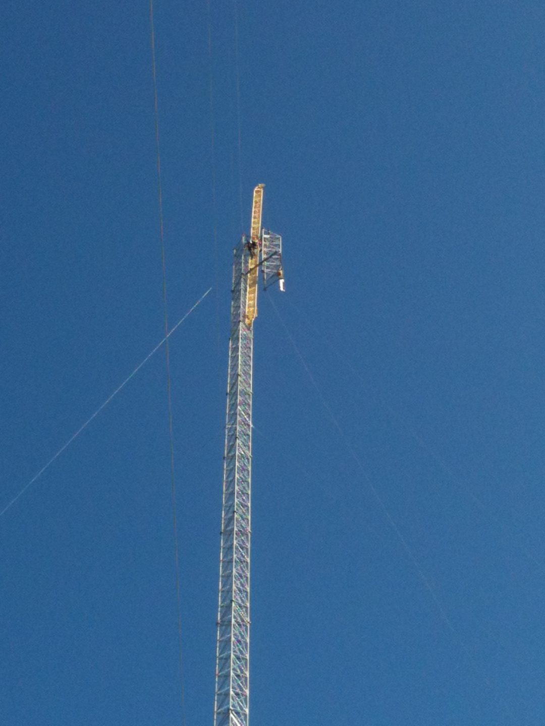 towe stacking with gin pole - Houston's Tower Service